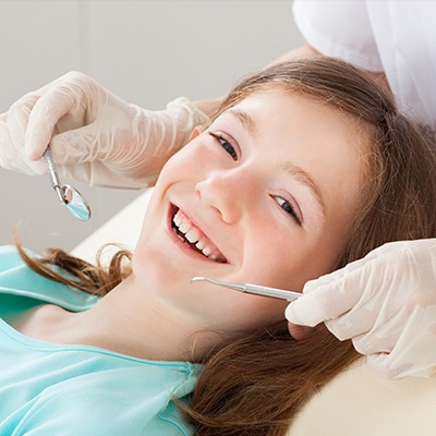 young girl getting checkup