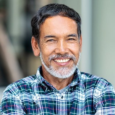 man in plaid shirt