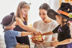 family celebrating Halloween