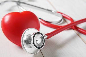 Red heart and stethoscope for Heart Health Month