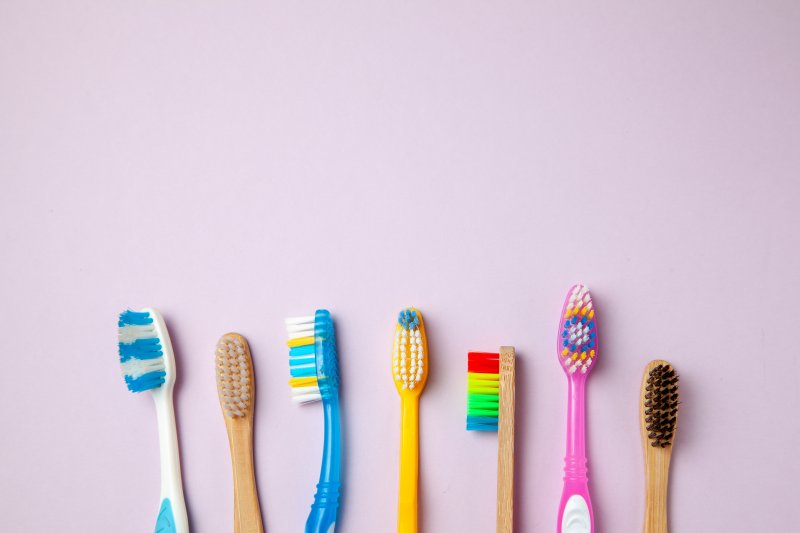 row of colored toothbrushes