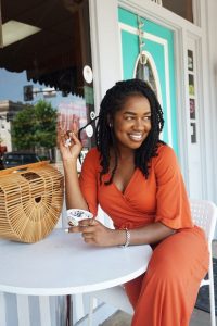 Woman sitting at outside table